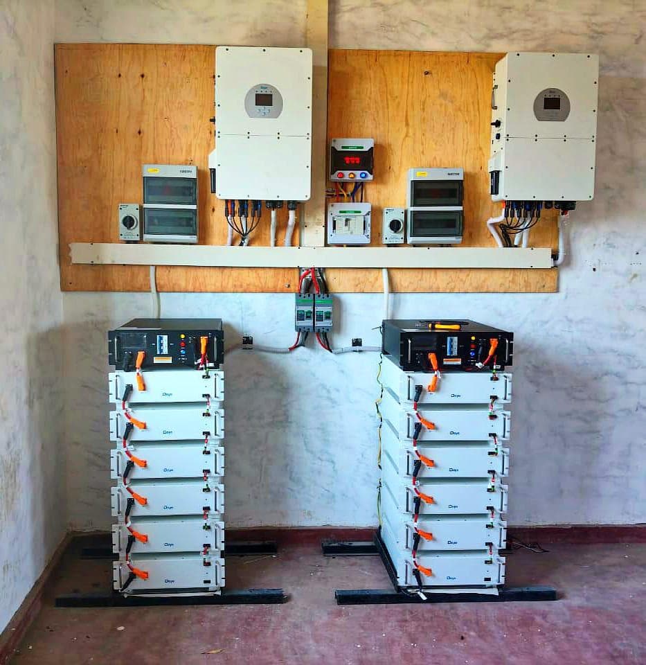Solar power plant room with inverters and battery storage